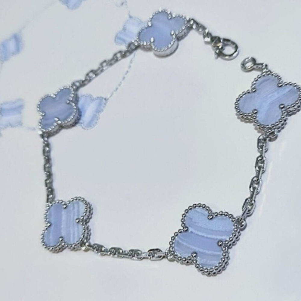 Elegant Silver and Blue Clover Bracelet
